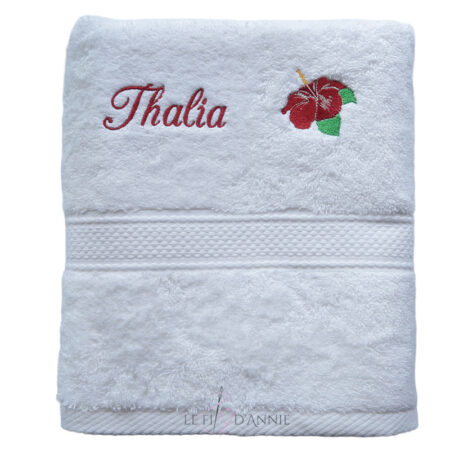 Linge de toilette blanc avec un hibiscus