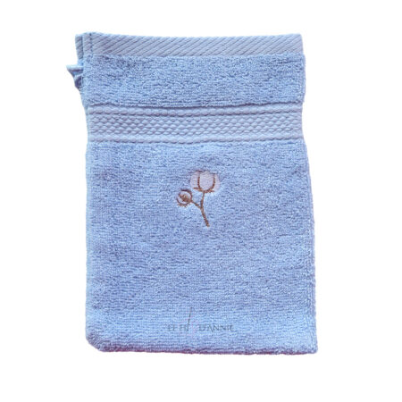 Gant de toilette avec une fleur de coton