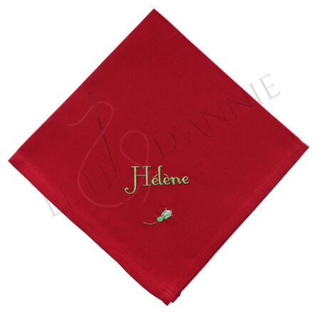 Serviette de table avec un bouton de rose
